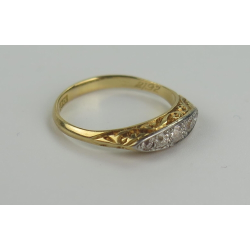 159 - 18ct Gold and Diamond Five Stone Ring with chased foliate shoulders, size J.75, 2.2g