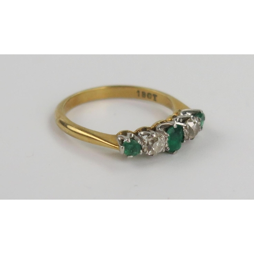 161 - 18ct Gold, Emerald and Diamond Five Stone Ring with a platinum claw setting, central stone c. 4.5x3.... 