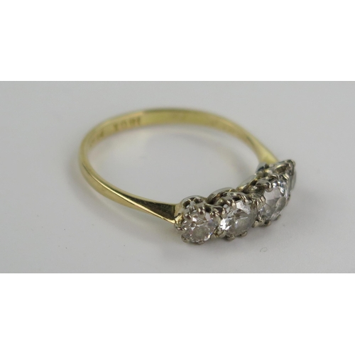 197 - An 18ct Gold and Platinum Diamond Four Stone Ring, EDW 1.5ct, size R.5, 3g