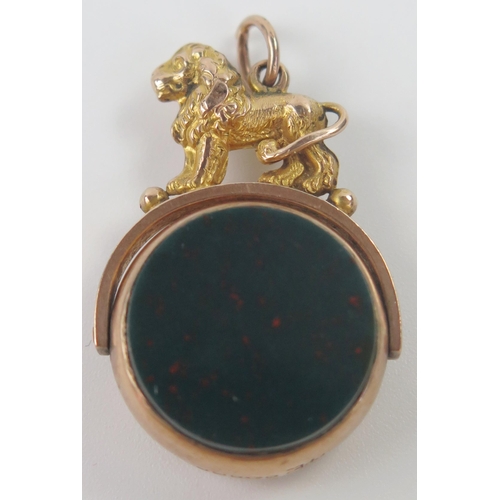 20 - Antique 9ct Gold Spinning Fob with lion rampant surmount and set with bloodstone and agate, c. 34mm ... 
