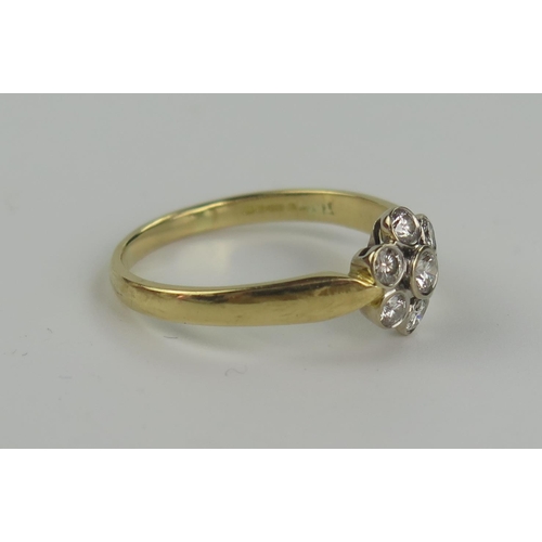 201 - A Modern 18ct Yellow Gold and Diamond Seven Stone Flower Head Cluster Ring, .55ct, 10mm head, size T... 