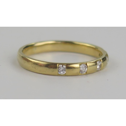 205 - An 18ct Yellow and Diamond Five Stone Band, EDW .3ct, size T, 4.1g