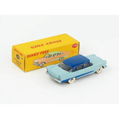 2071 - A Dinky Toys 178 Plymouth Plaza in light blue with dark blue roof and flash, spun hubs and mottled b... 