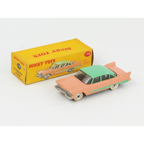 2072 - A Dinky Toys 178 Plymouth Plaza in salmon pink with light green roof and flash, spun hubs and mottle... 