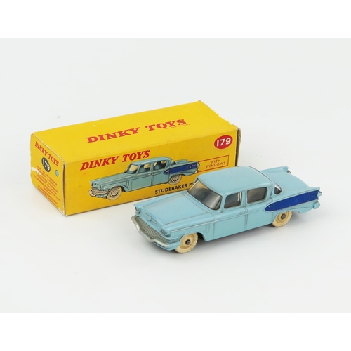 2073 - A Dinky Toys 179 Studebaker President Sedan in light blue with dark blue flash and cream hubs in cor... 