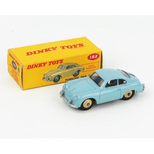 2079 - A Dinky Toys Porsche 356A Coupe in pale blue with cream hubs in correct colour spot box. Excellent i... 