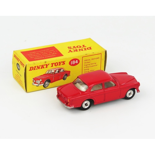 2081 - A Dinky Toys 184 Volvo 122S in red with white interior, spun hubs and gloss black base. Exc/near min... 