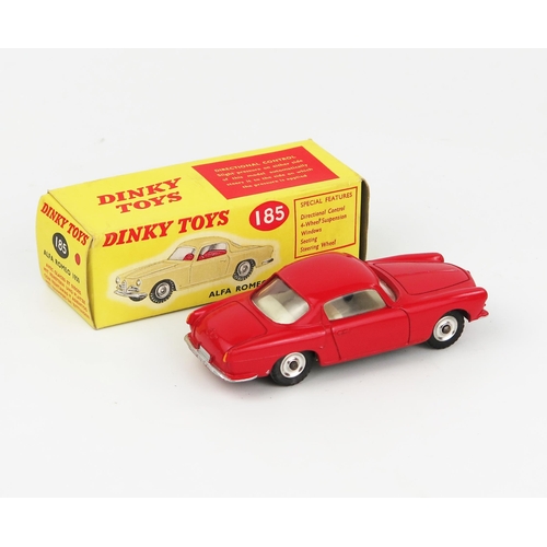 2083 - A Dinky Toys 185 Alfa Romeo 1900 Coupe in red with off-white interior in correct colour spot box. Ne... 