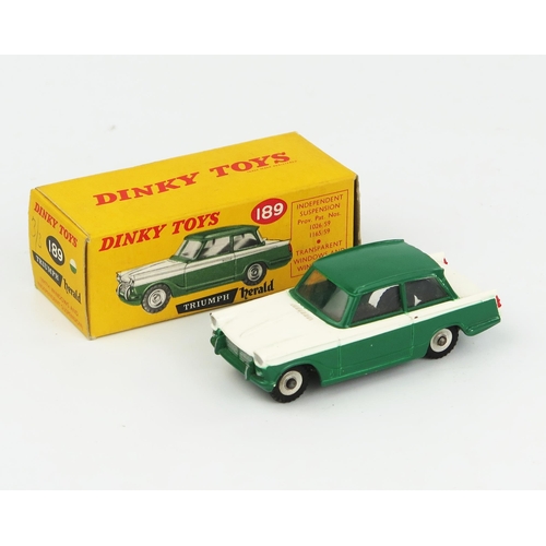 2088 - A Dinky Toys 189 Triumph Herald in dark green with white centre in correct colour spot type 1 pictur... 