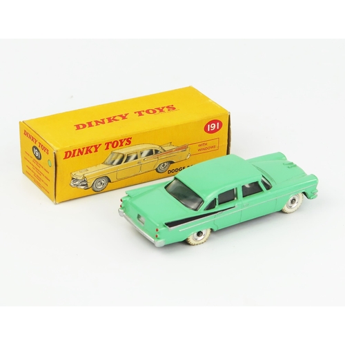 2089 - A Dinky Toys 191 Dodge Royal Sedan in pale green with black flash, spun hubs, white tyres and matt b... 