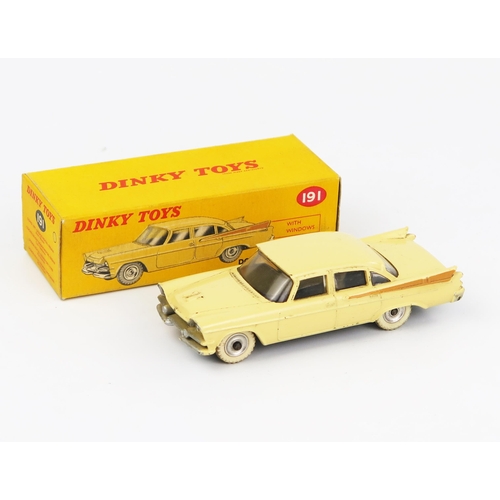 2090 - A Dinky Toys 191 Dodge Royal Sedan in cream with tan flash, spun hubs, white tyres and matt black ba... 