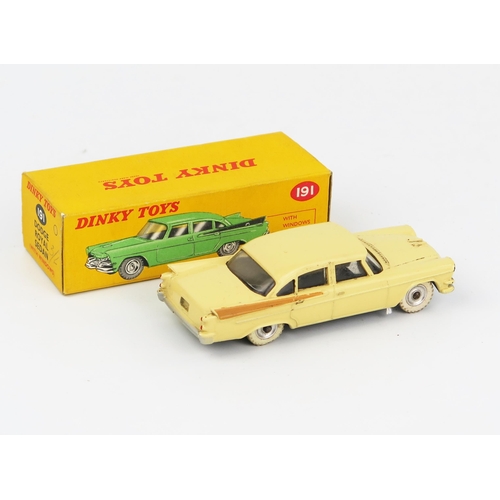 2090 - A Dinky Toys 191 Dodge Royal Sedan in cream with tan flash, spun hubs, white tyres and matt black ba... 