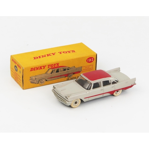 2091 - A Dinky Toys 192 De Soto Fireflite Sedan in grey with red roof and flash, spun hubs and white tyres ... 