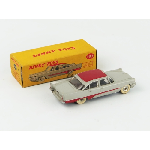 2091 - A Dinky Toys 192 De Soto Fireflite Sedan in grey with red roof and flash, spun hubs and white tyres ... 