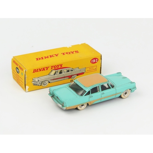 2092 - A Dinky Toys 192 De Soto Fireflite Sedan in turquoise with tan roof and flash, spun hubs and white t... 