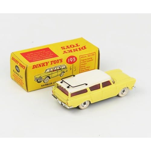 2093 - A Dinky Toys 193 Rambler Cross Country Station Wagon in pale yellow with white roof and tyres, spun ... 