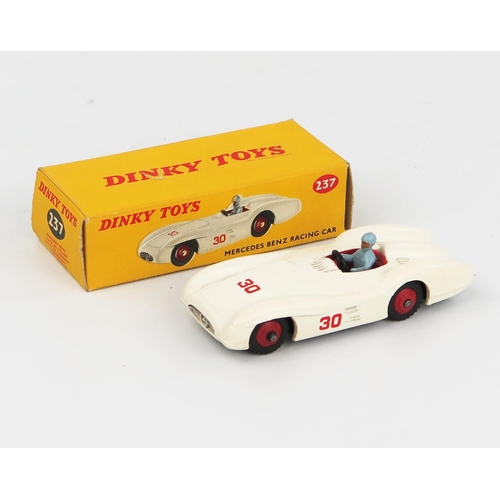 2102 - A Dinky Toys 237 Mercedes Benz Racing Car in white with red interior, hubs and RN '30', blue driver ... 