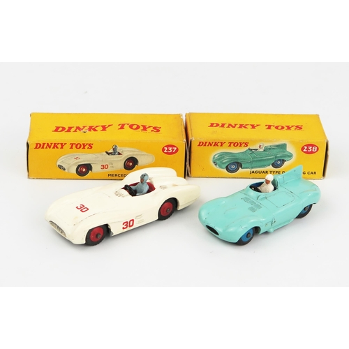 2104 - Two Dinky Toys Racing Cars - A 237 Mercedes Benz Racing Car in white with red interior, hubs and RN ... 