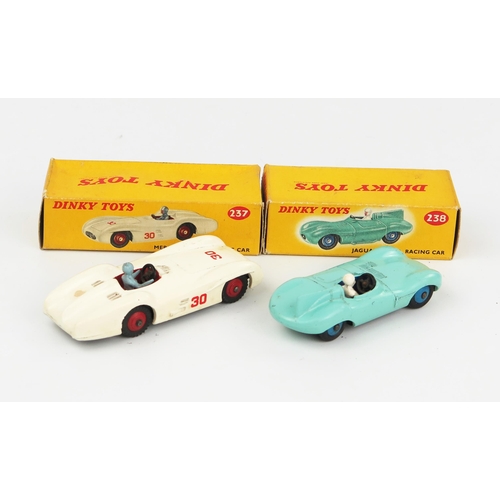 2104 - Two Dinky Toys Racing Cars - A 237 Mercedes Benz Racing Car in white with red interior, hubs and RN ... 