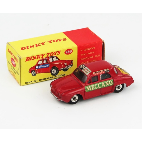 2106 - A Dinky Toys 268 Renault Dauphine Minicab in red with 'Meccano', 'Kenwood', 'HP' and 'Britax' advert... 