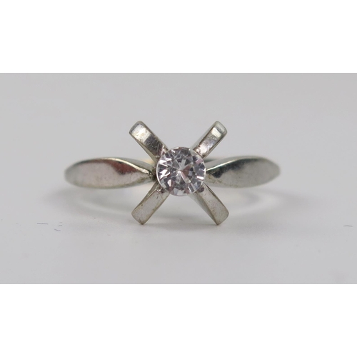 212 - 18ct White Gold and Diamond Solitaire Ring in a contemporary claw setting, size O.75, 4.5g