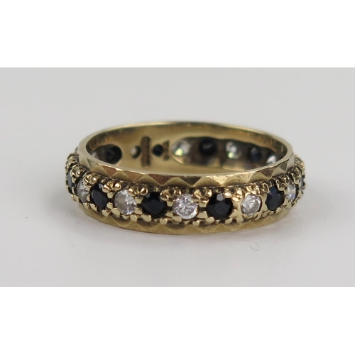 213 - 9ct Gold, Sapphire and CZ Eternity ring, size O, 3.2g