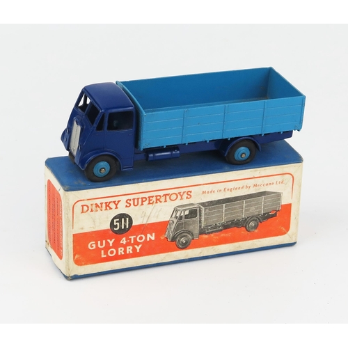 2163 - A Dinky Supertoys 511 Guy 4-Ton Lorry 1st type cab, violet blue cab, chassis and wings, mid blue bac... 