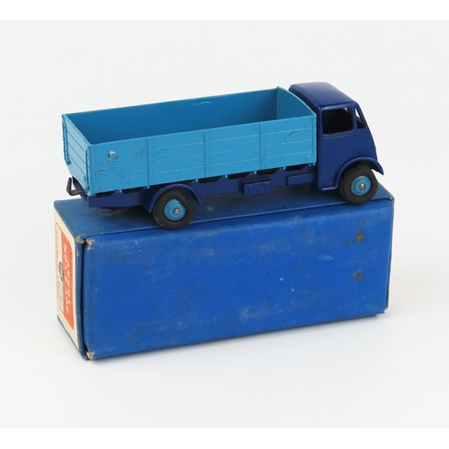 2163 - A Dinky Supertoys 511 Guy 4-Ton Lorry 1st type cab, violet blue cab, chassis and wings, mid blue bac... 