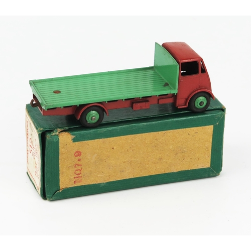 2165 - A Dinky Supertoys 512 Guy Flat Truck type 1 cab, brown cab, wings and chassis, mid green back, unpai... 