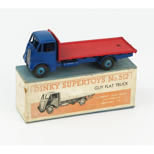 2166 - A Dinky Supertoys 512 Guy Flat Truck type 1 cab, dark blue cab, wings and chassis, red back, mid blu... 