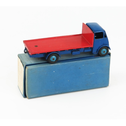 2166 - A Dinky Supertoys 512 Guy Flat Truck type 1 cab, dark blue cab, wings and chassis, red back, mid blu... 