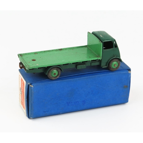 2167 - A Dinky Supertoys 512 Guy Flat Truck type 1 cab, dark Brunswick green cab, wings and chassis, mid gr... 