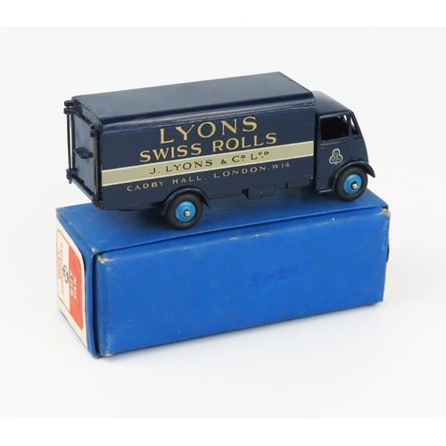 2172 - A Dinky Supertoys 514 Guy Van 'LYONS' 1st type cab, dark cab, chassis and back, mid blue hubs, cast ... 