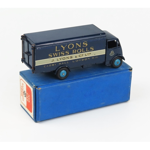 2173 - A Dinky Supertoys 514 Guy Van 'LYONS' 1st type cab, dark cab, chassis and back, mid blue hubs, cast ... 