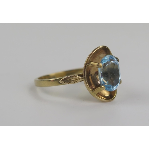 218 - 9ct Gold and Aqua Marine Dress Ring, 10x8mm stone, size P.5, 4.8g