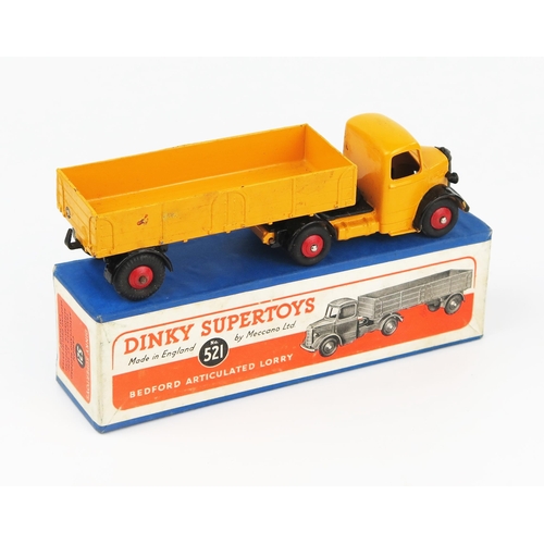 2180 - A Dinky Supertoys 521 Bedford Articulated Lorry in yellow-orange with black wings and red hubs in bl... 