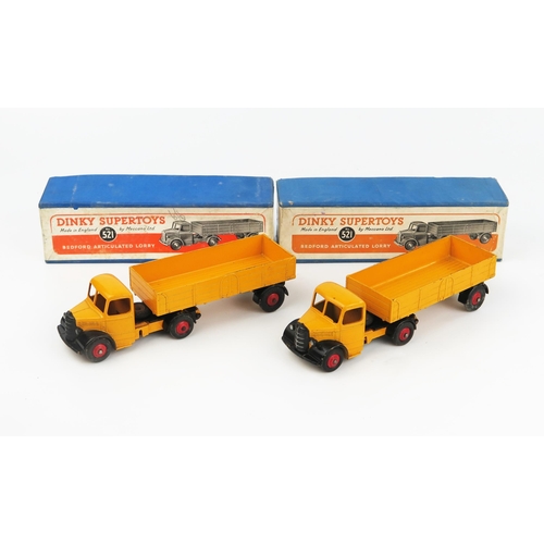 2182 - Two Dinky Supertoys 521 Bedford Articulated Lorries in yellow-orange with black wings and red hubs i... 