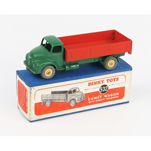 2195 - A Dinky Supertoys 532 Comet Wagon with Hinged Tailboard with dark green cab and chassis, orange back... 