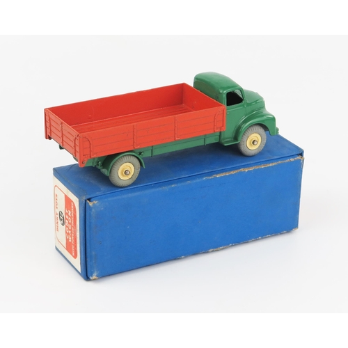 2195 - A Dinky Supertoys 532 Comet Wagon with Hinged Tailboard with dark green cab and chassis, orange back... 