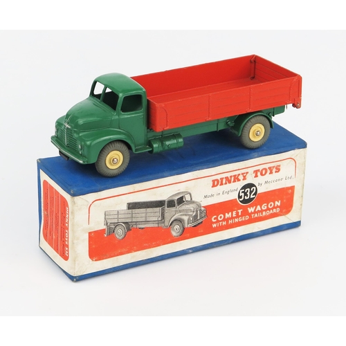 2196 - A Dinky Supertoys 532 Comet Wagon with Hinged Tailboard with dark green cab and chassis, orange back... 