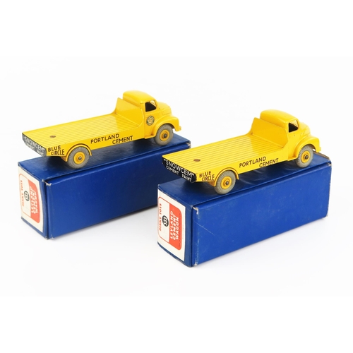 2199 - Two Dinky Supertoys 533 Leyland Comet Wagons 'PORTLAND BLUE CIRCLE CEMENT' in yellow with yellow hub... 