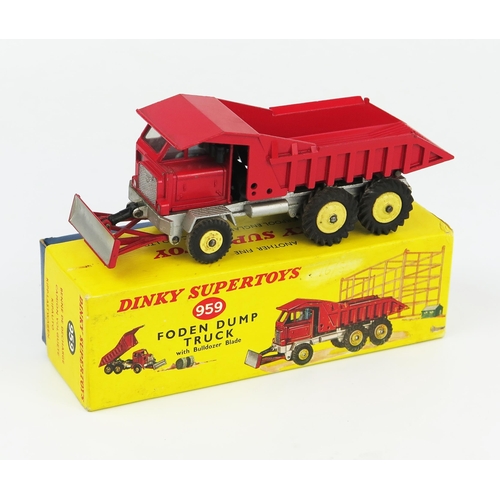 2214 - A Dinky Supertoys 959 Foden Dump Truck in red with silver chassis and blade with pale yellow plastic... 