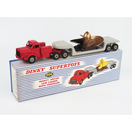 2226 - A Dinky Supertoys 986 Mighty Antar Low Loader with Propeller, red tractor unit with no windows, grey... 