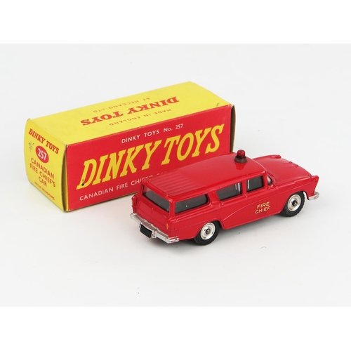 2231 - A Dinky Toys 257 Nash Rambler Canadian Fire Chief's Car in red with red light and spun hubs in red/y... 