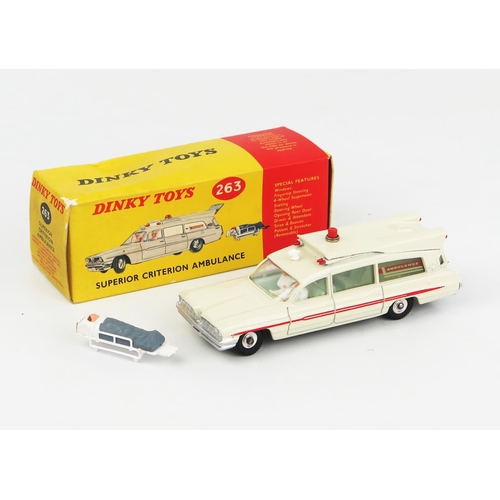 2233 - A Dinky Toys 263 Superior Criterion Ambulance in off-white with turquoise interior and spun hubs. Ve... 