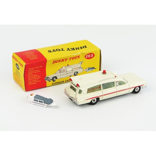 2233 - A Dinky Toys 263 Superior Criterion Ambulance in off-white with turquoise interior and spun hubs. Ve... 