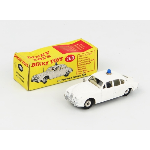 2235 - A Dinky Toys 269 Jaguar 3.4 Litre Motorway Police Car in matt white with light grey interior, blue r... 