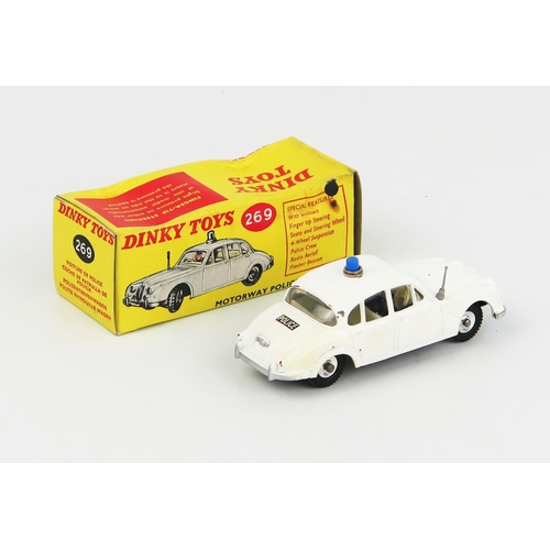 2235 - A Dinky Toys 269 Jaguar 3.4 Litre Motorway Police Car in matt white with light grey interior, blue r... 