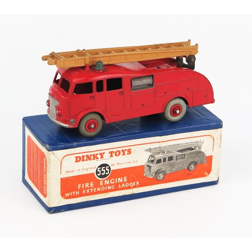 2238 - A Dinky Toys 555 (Commer) Fire Engine with Extending Ladder in red with tan ladder, no windows, red ... 