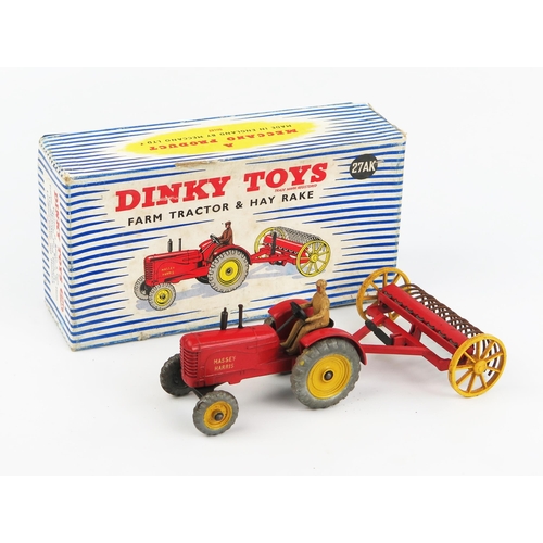 2243 - A Dinky Toys 27AK Farm Tractor & Hay Rake (MASSEY HARRIS) in red with yellow hubs with. Very good wi... 